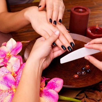 manicurist-master-makes-manicure-woman-s-hands-spa-treatment-concept