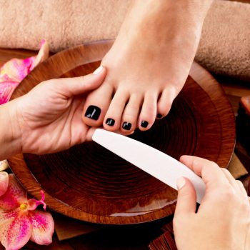 pedicurist-master-makes-pedicure-woman-s-legs-spa-treatment-concept